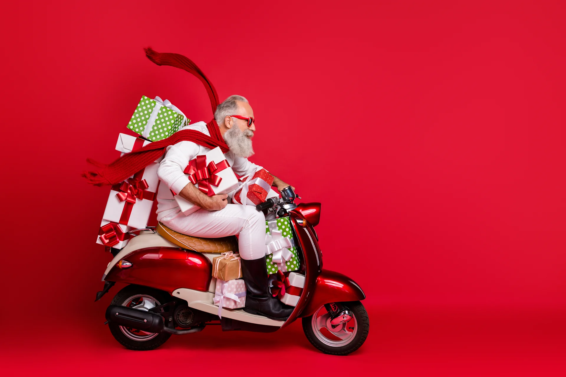 Santa on bike with gift parcels