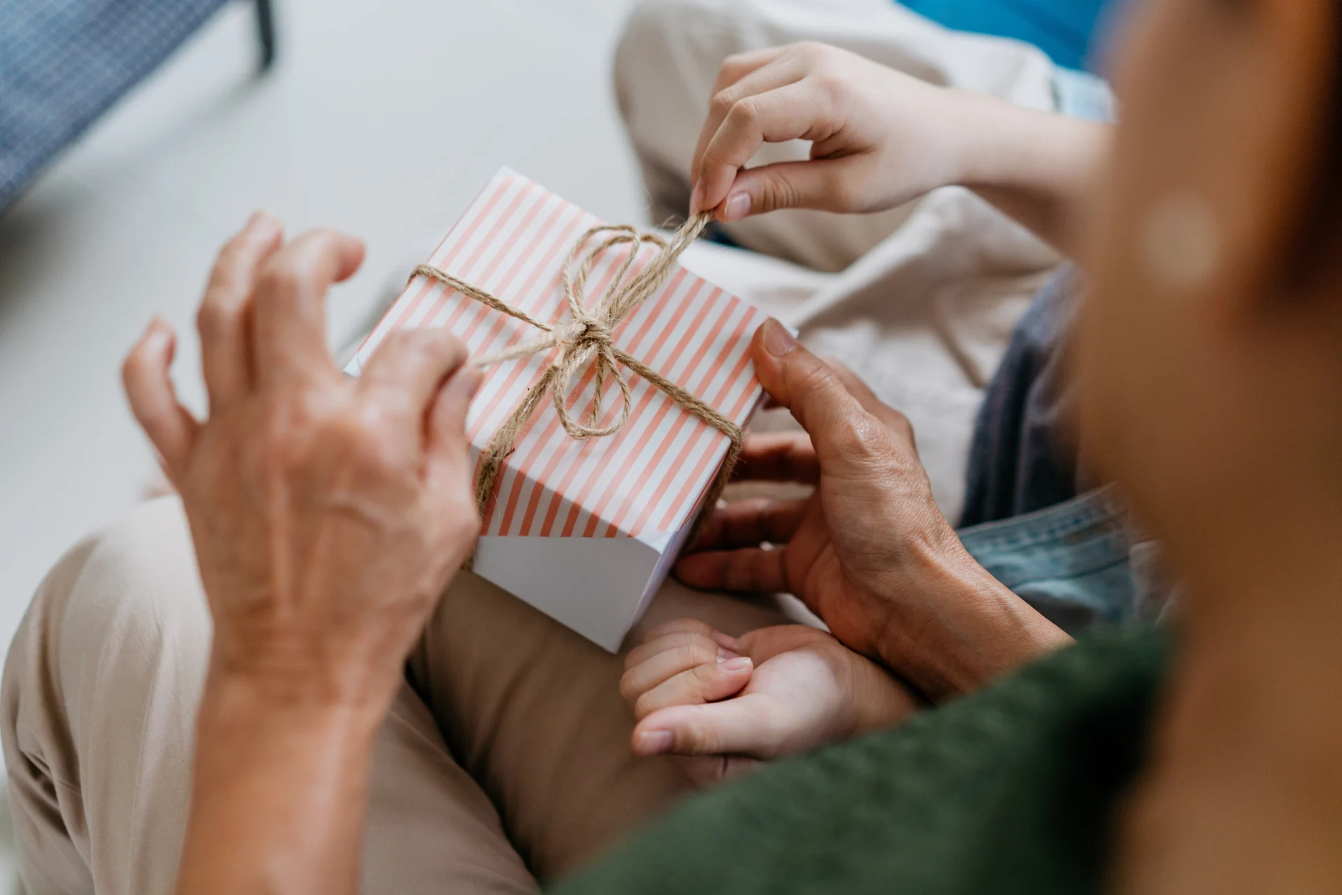 person unwrapping father's day gift