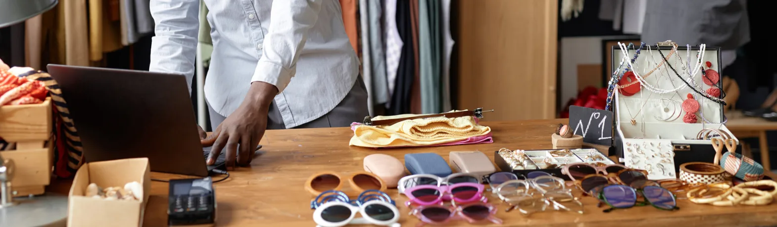 Man lists vintage clothing items online to sell 