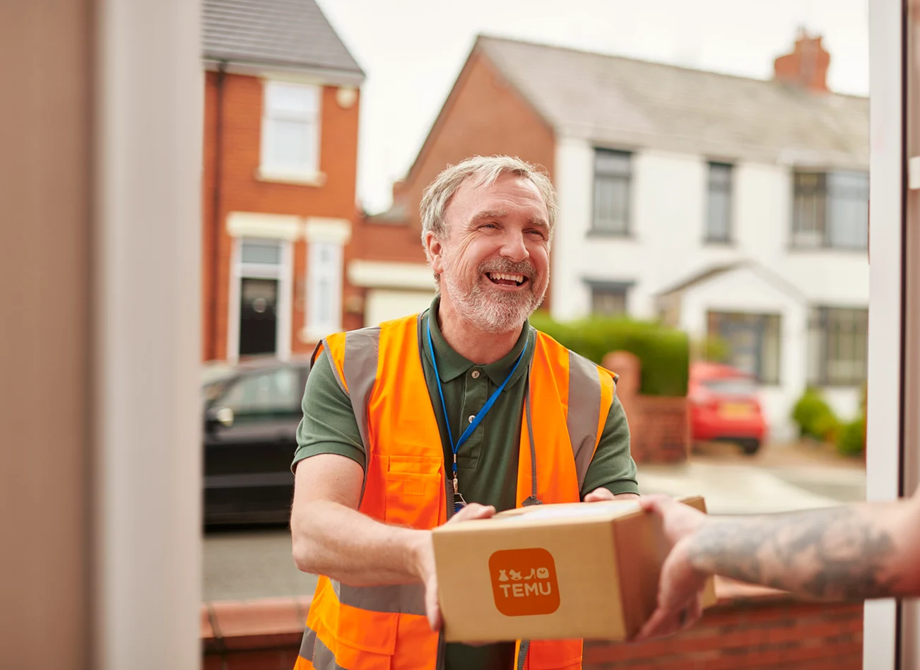 Man delivering Temu parcel