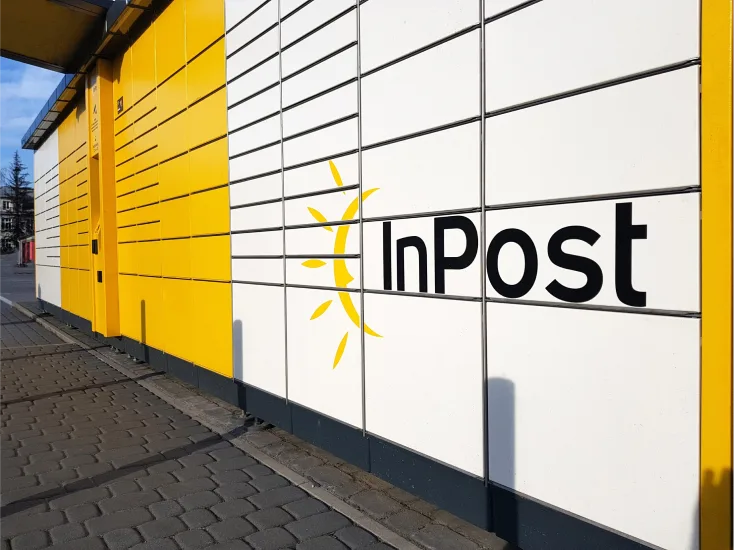 Image of postal pick up lockers with InPost brand logo
