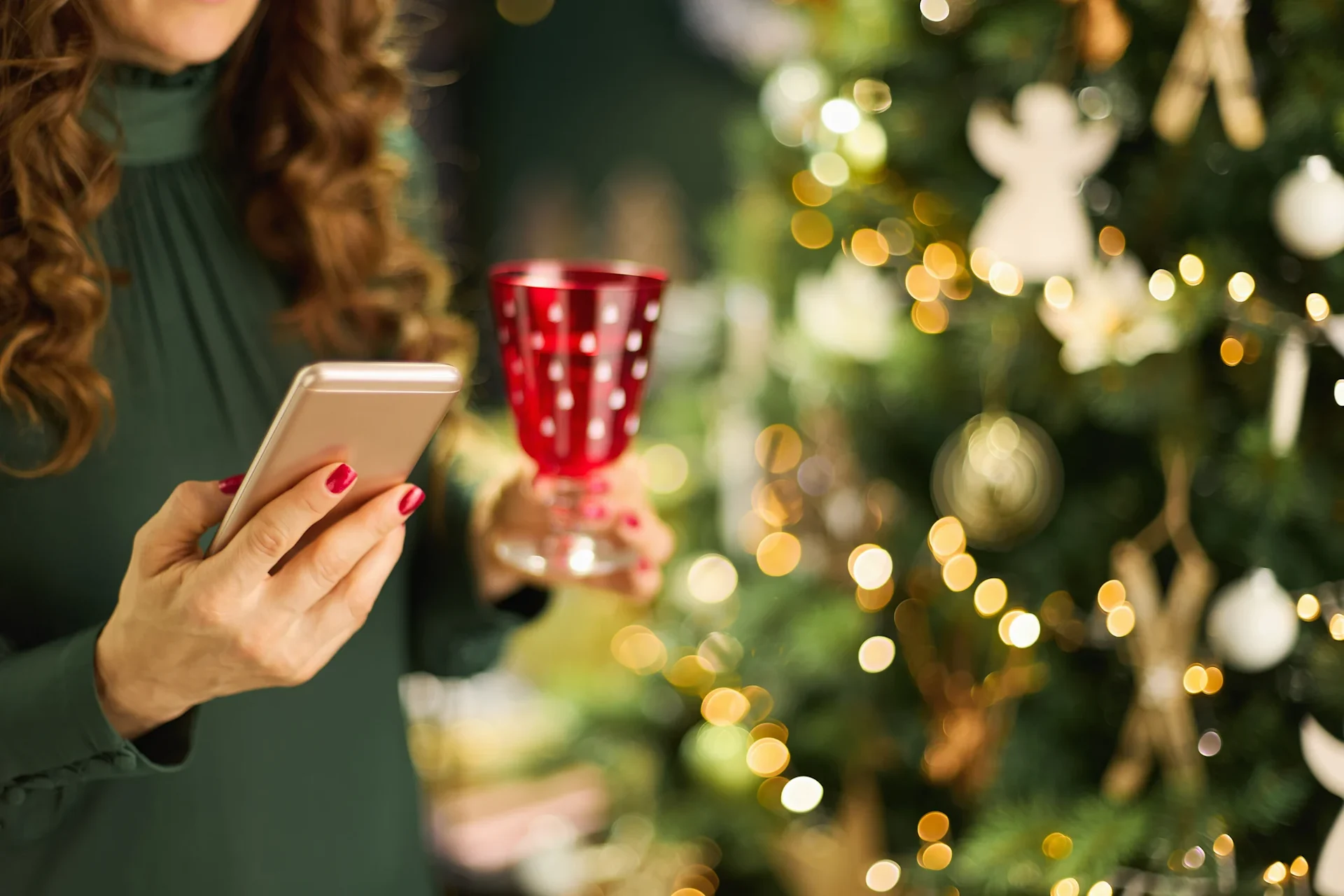 Woman on mobile phone during Christmas